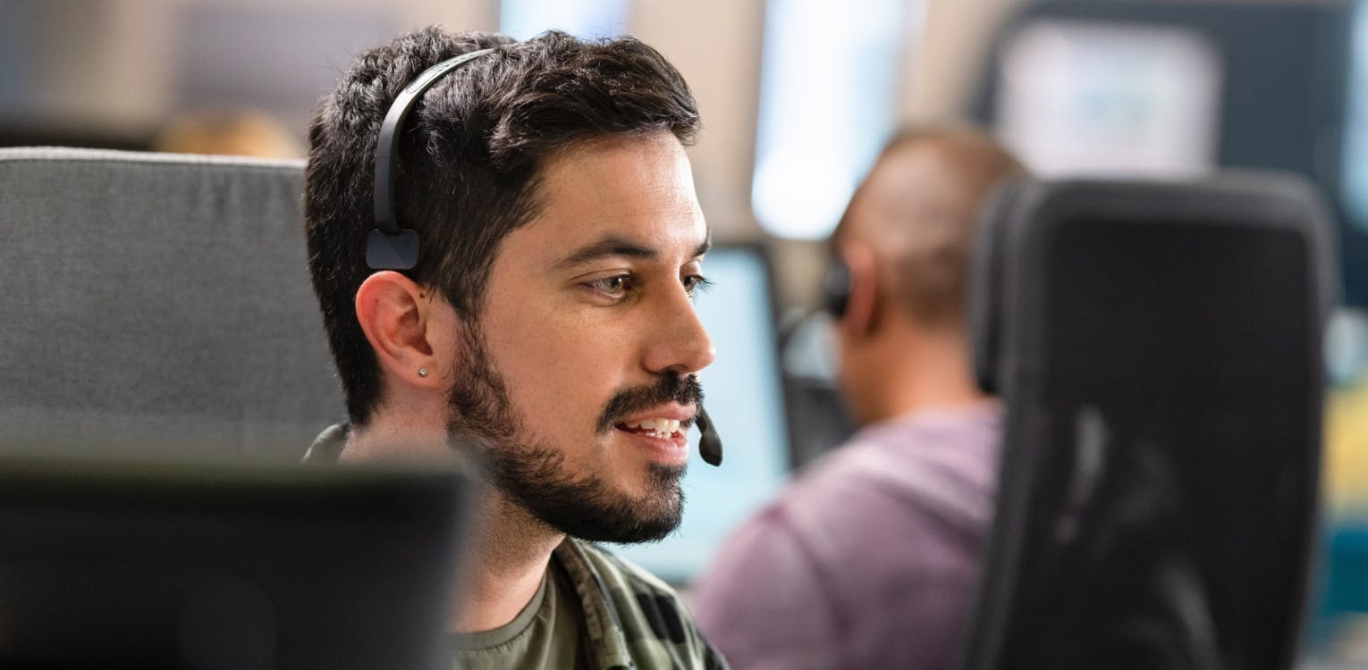 Man with Headset in Office