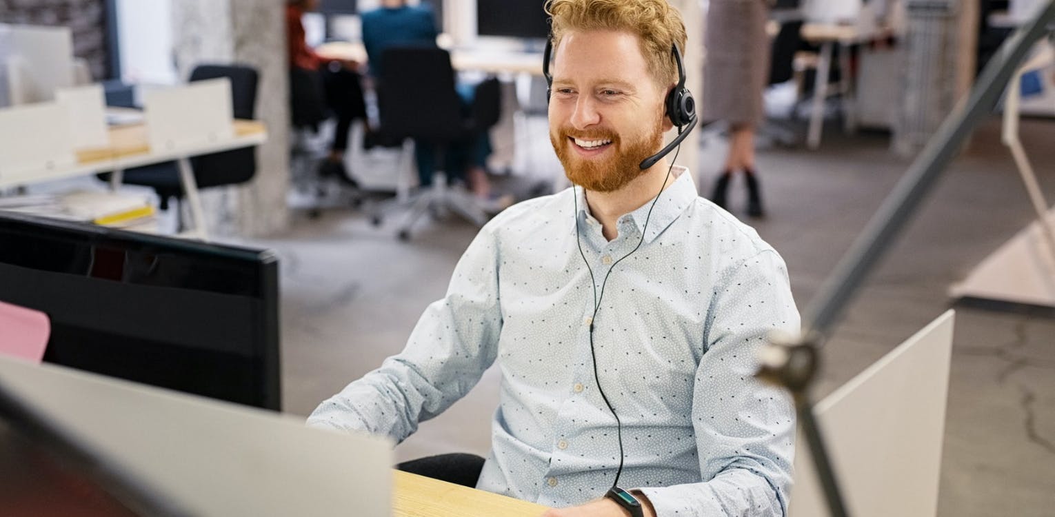 Smiling Man with Headset