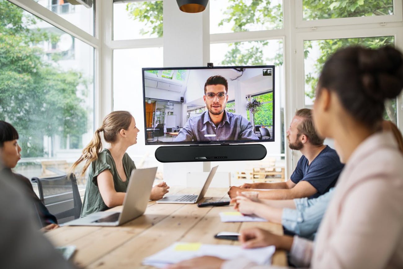 Video Conference in Office with Video Bar and TV